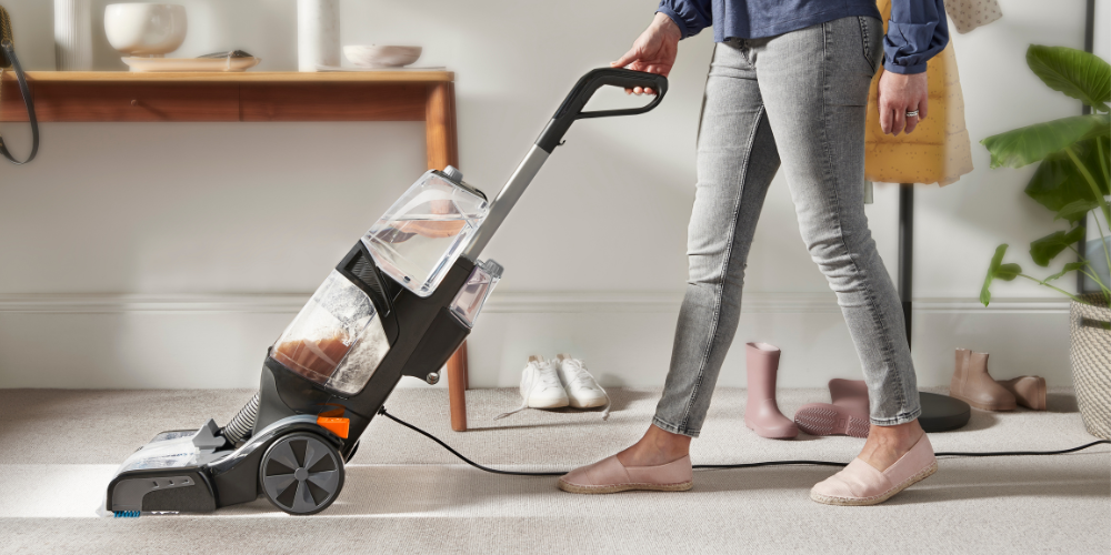 Cleaning a light beige carpet with a Vax carpet washer